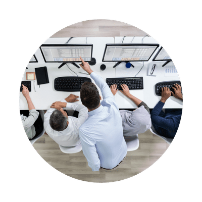 shared office space with workers on computers