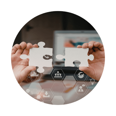 hands connecting puzzle pieces